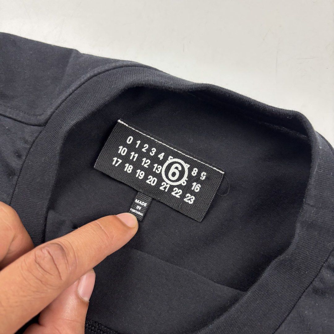 Maison Margiela Logo Patch Tshirt (Category: Shirts) located in Makati City. Submitted by ragrepository (Listing ID 1468729034, Image 3). Description: Maison Margiela Logo Patch Tshirt Tagged as Small Length- 22.5” Pit to pit- 17.5” Sleeves- 5.5” Shoulder-15” Condition-9/10 Flaw- None .