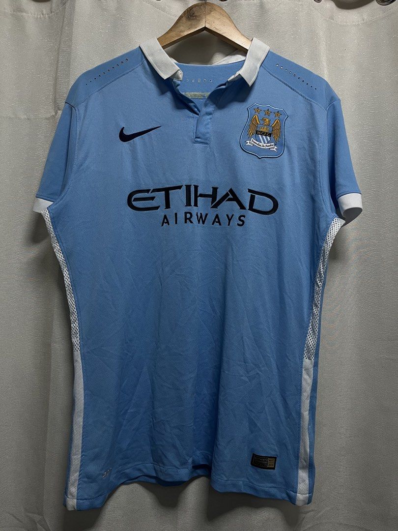 Manchester City 2013/2014 Home Nike Jersey (Category: Activewear) located in Davao. Submitted by znerol_26 (Listing ID 1468832321, Image 1). Description: - Authentic Manchester City 2013/2014 home kit - Classic sky blue design with a stylish white polo collar - Nike Swoosh embroidery and club crest on the chest - Iconic Etihad Airways front sponsor - Breathable white mesh side panels with Dri-FIT fabric technology - Size: XL (includes authentic p