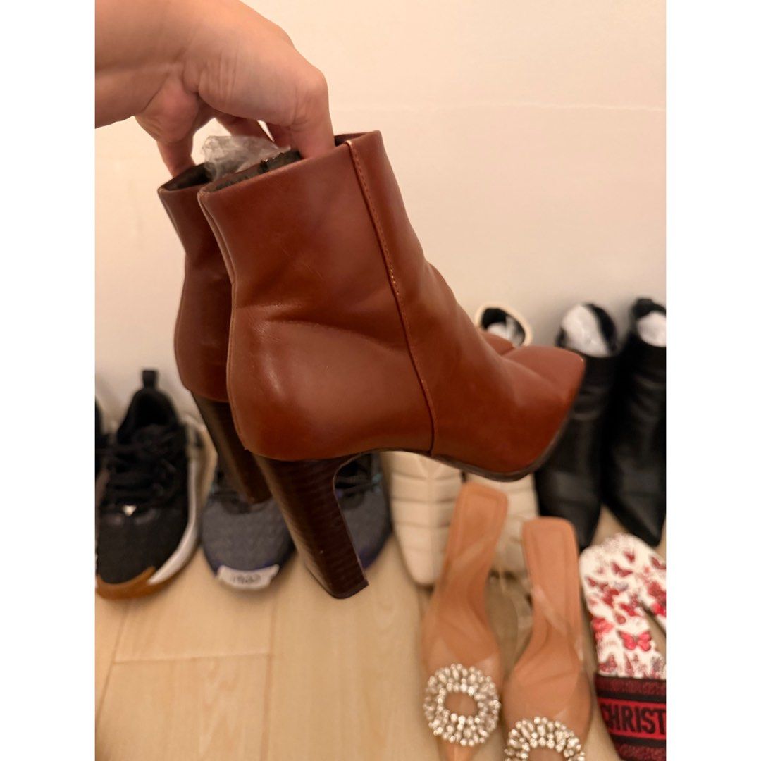 Mango Brown Leather Boots (Category: Boots) located in Rizal. Submitted by mariasdeclutteringshop (Listing ID 1468811125, Image 2). Description: Bought from Europe. Selling because I’m moving out of the country. Has some color faded in front of as seen on the photos. .