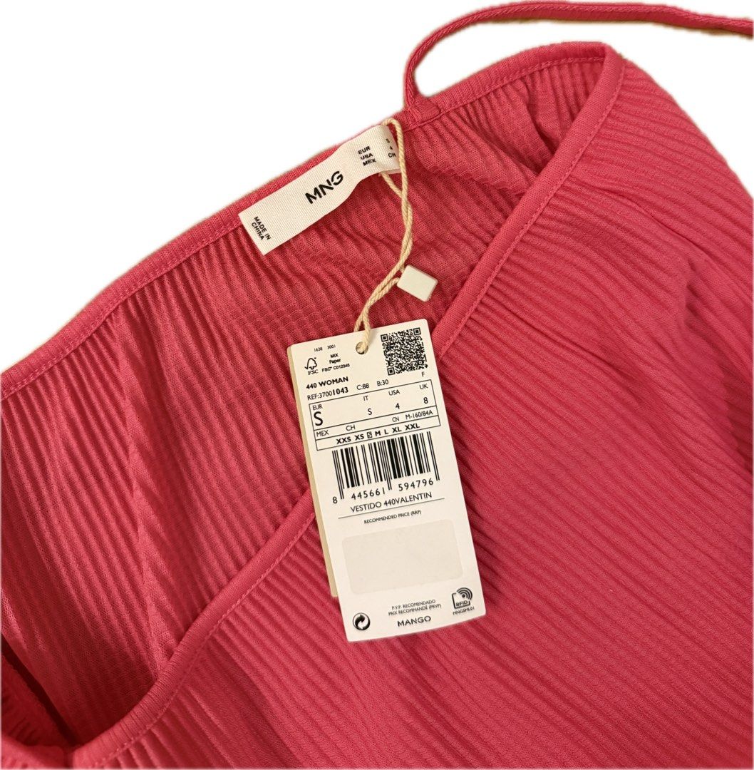 MANGO Pink Pleated Dress (Category: Dresses) located in Cavite. Submitted by fitarchive (Listing ID 1468717265, Image 2). Description: - Brand: Mango (Style: Vestido 440Valentin) - Condition: Brand new with original store tags attached, never worn - Color: Bright pink - Material: Textured ribbed fabric throughout - Design: Dramatic puff sleeves, deep V-neckline, and front center tie detail.