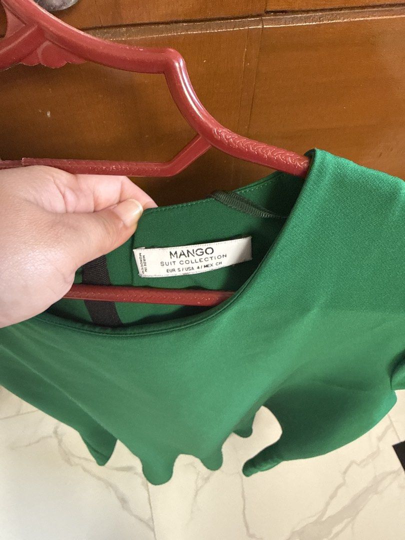 Mango Suit Collection Green Dress Size S (Category: Dresses) located in Manila. Submitted by zealbear_602543 (Listing ID 1468739789, Image 2). Description: - Brand: Mango Suit Collection - Color: Vibrant Green - Size: EUR S / USA 4 - Design: Short sleeves, round neckline, drop waist with flared hem - Closure: Back zip - Condition: Clean, ready to wear - Versatility: Perfect for casual outings or office workwear.