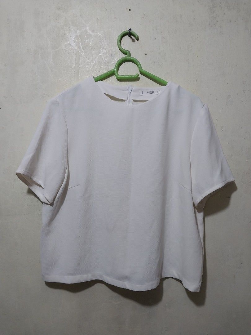 Mango White Short Sleeve Blouse Size L (Category: Blouses) located in Manila. Submitted by PrinceDani.Clothing (Listing ID 1468762259, Image 1). Description: mango off white cropped top large 22in width 20in length excellent condition .
