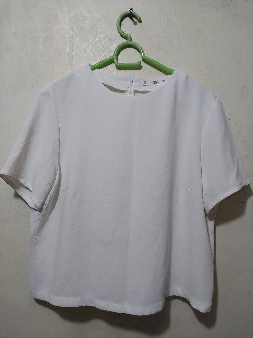 Mango White Short Sleeve Blouse Size L (Category: Blouses) located in Manila. Submitted by PrinceDani.Clothing (Listing ID 1468762259, Image 2). Description: mango off white cropped top large 22in width 20in length excellent condition .