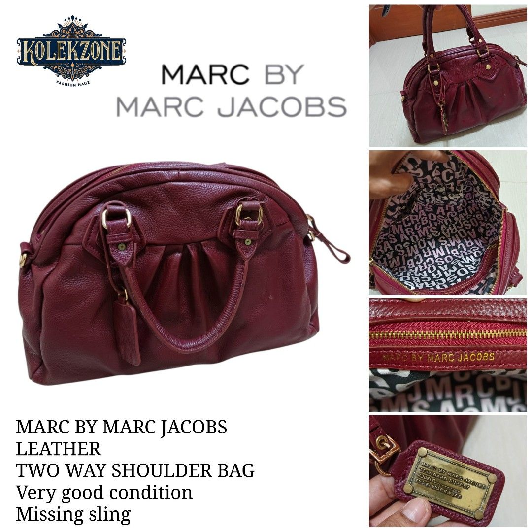 Marc by Marc Jacobs Leather Two Way Shoulder Bag (Category: Luxury Bags & Wallets) located in Nasugbu. Submitted by staffpicks1515 (Listing ID 1468788875, Image 1). Description: - Brand: Marc by Marc Jacobs - Material: Genuine burgundy leather with gold-tone hardware - Design: Gathered details with iconic Standard Supply metal plaque - Closure & Interior: Top zip closure, printed fabric lining, and inner zipper pocket - Handles: Dual top handles 