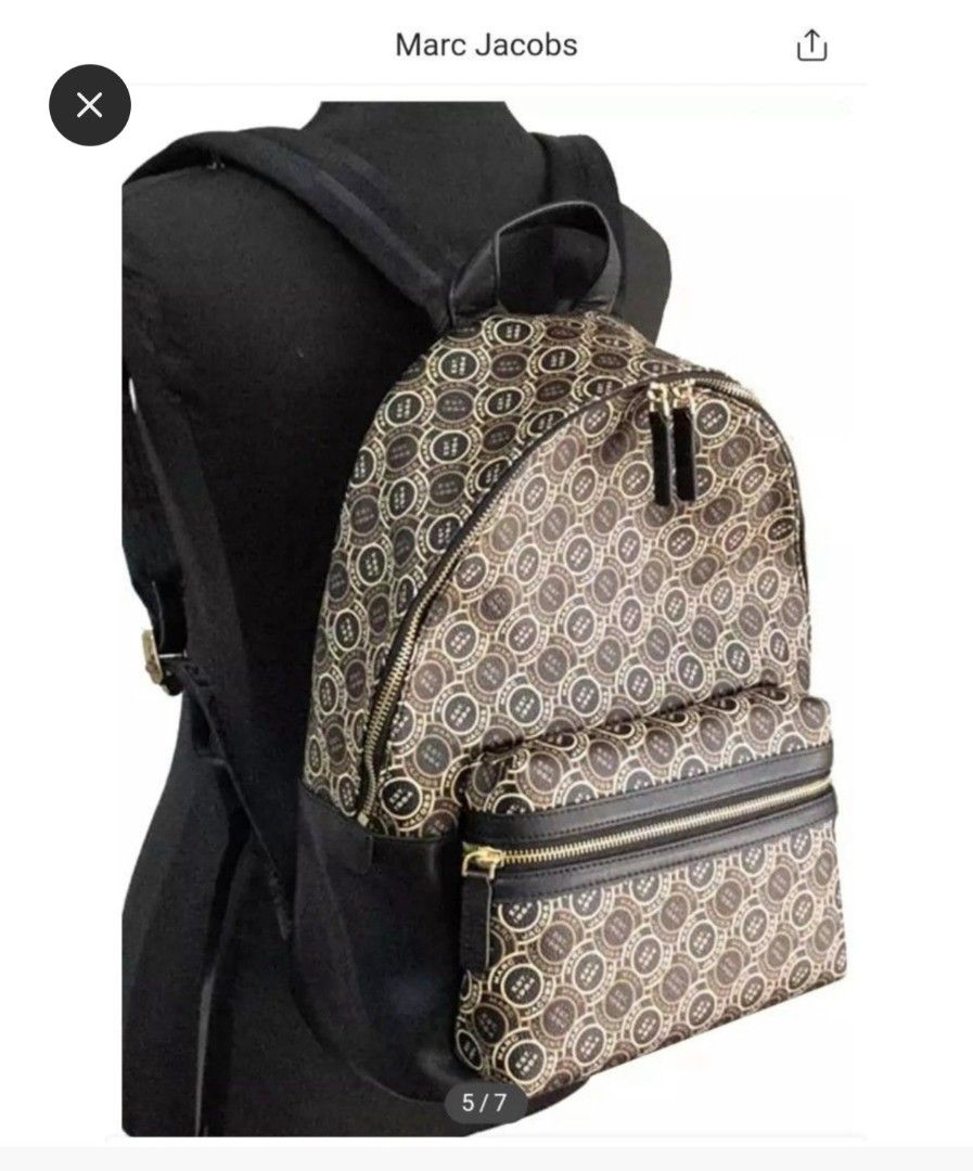 Marc Jacobs Backpack Signet Bagpack (Category: Luxury Bags & Wallets) located in Binan City. Submitted by thelleshop (Listing ID 1468776955, Image 1). Description: SUPER SALE! ✅️100% Authentic Original ✅️ With tag and care card ❌️ We don't sell fakes/replica Used few times In good condition Flaw: slight peeling of leather on bottom part only, kindly zoom in the pic. good thing bottom part so hindi halata :) gold metal hard ware still shiny Strict