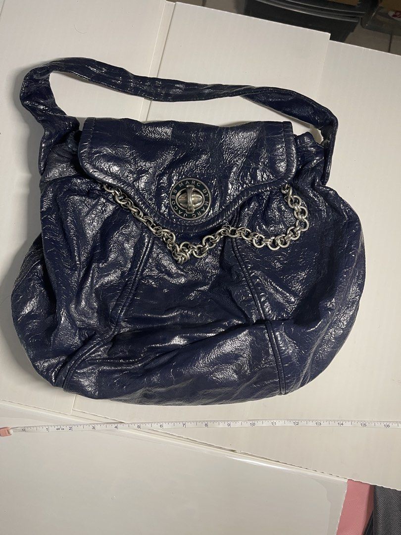Marc Jacobs crinkled leather bag (Category: Shoulder Bags) located in Mandaluyong City. Submitted by coolmeybab (Listing ID 1468774101, Image 1). Description: Pre-loved bag - please manage expectations Color: dark blue Stained with ink inside and blotted at the bottom part (not very obvious) Other than that, no issue .