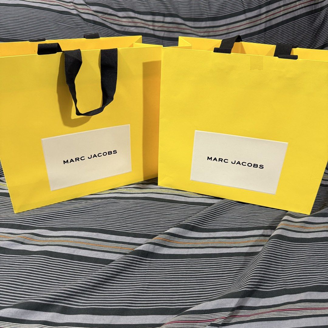 Marc Jacobs Paper Bag (Category: Everything Else Others) located in Quezon City. Submitted by jshoppppp (Listing ID 1468923177, Image 1). Description: Authentic paper bags from Marc Jacobs Size: 9” x 9” Used once during store purchase, no issues P450 each BPI, BDO, Gcash Delivery c/o buyer.