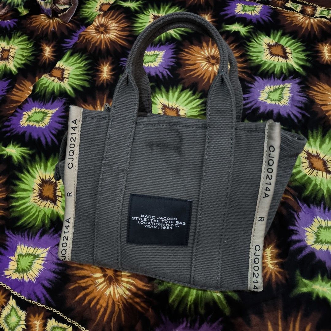 Marc Jacobs The Jacquard Small Tote Bag (Category: Luxury Bags & Wallets) located in Quezon City. Submitted by jedclo (Listing ID 1468840590, Image 2). Description: In pristine condition Color due lightning MOP: GCASH, DM to purchase Disclaimer: "All brand names, logos, and images are registered trademarks of their respective owners. No affiliation or copyright infringement intended.