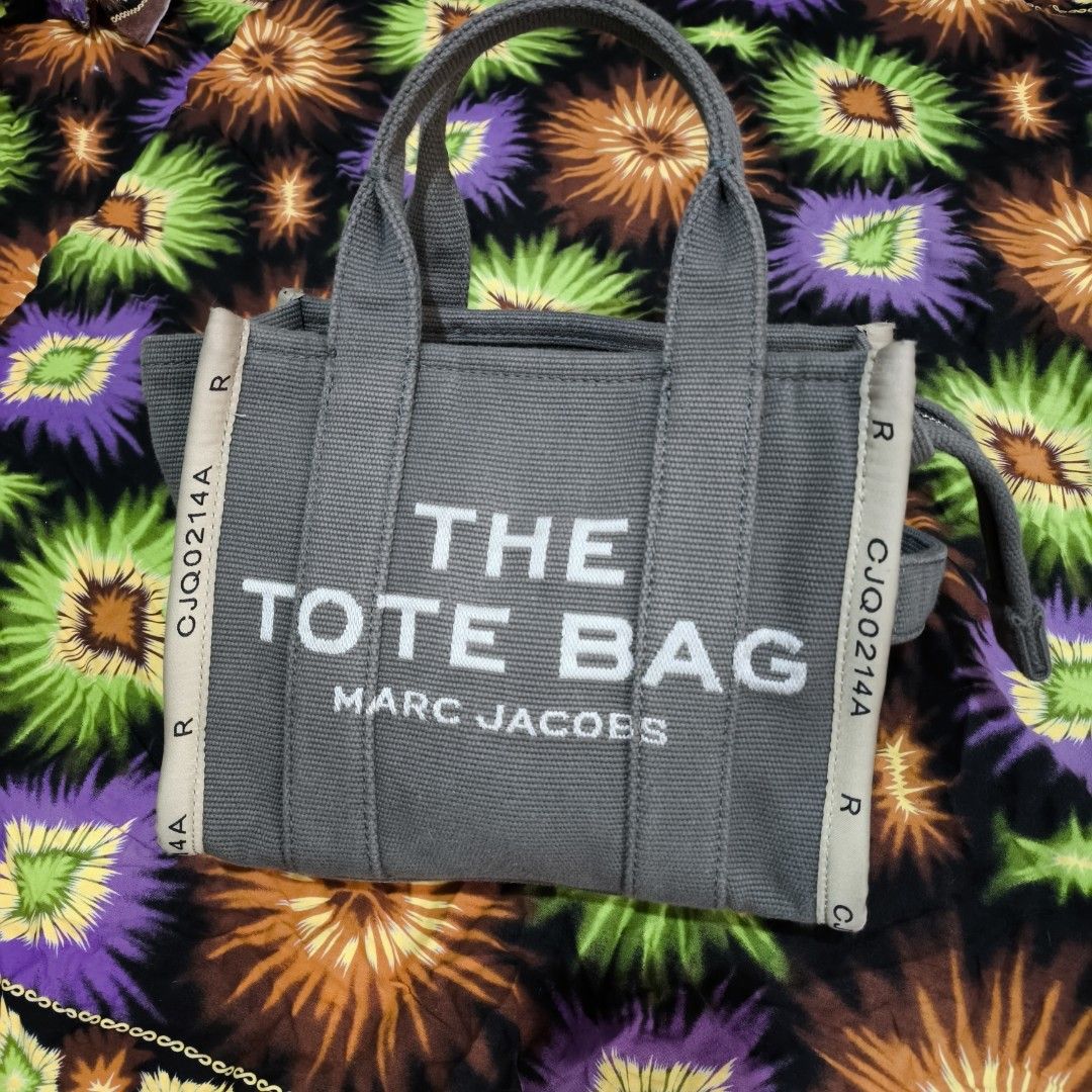 Marc Jacobs The Jacquard Small Tote Bag (Category: Luxury Bags & Wallets) located in Quezon City. Submitted by jedclo (Listing ID 1468840590, Image 1). Description: In pristine condition Color due lightning MOP: GCASH, DM to purchase Disclaimer: "All brand names, logos, and images are registered trademarks of their respective owners. No affiliation or copyright infringement intended.