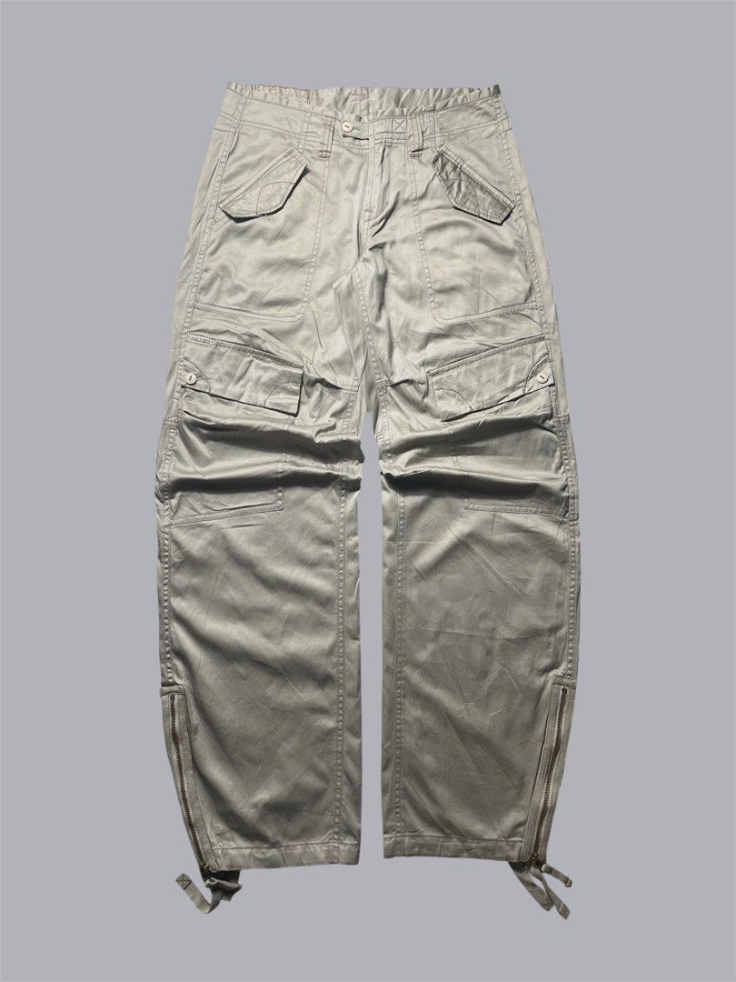 Marithe Francois Girbaud late 90’s multi cargo flared pants (Category: Jeans) located in Quezon City. Submitted by renovare.196 (Listing ID 1468884731, Image 1). Description: Marithe Francois Girbaud late 90’s multi cargo flared pants Excellent Condition Color Rate: 9.5/10 No Issue Measurements • Width: 30 • Length: 41 • Thigh: 12.5 • Hem: 8.5/10 Price: 3500 obo DM IF INTERESTED📥.
