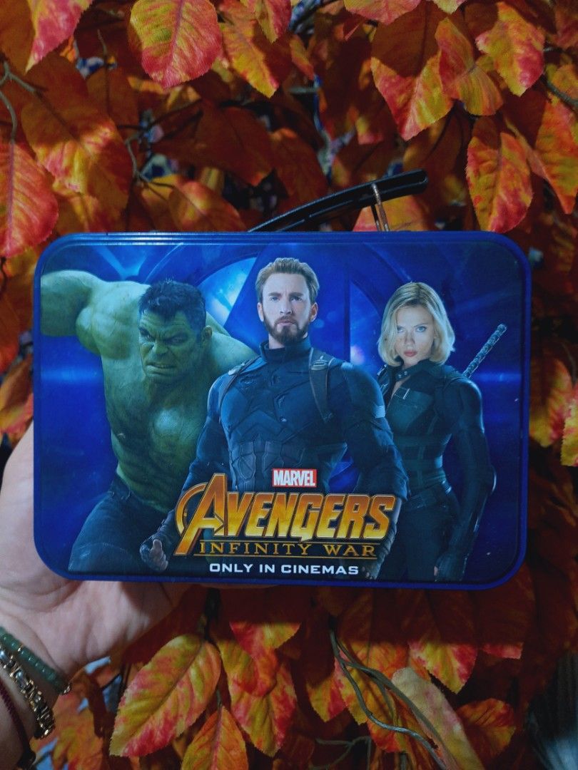 Marvel Avengers Infinity War Tin Box (Category: Western Merchandise) located in Paranaque City. Submitted by b_spilner (Listing ID 1468833207, Image 1). Description: - Authentic Marvel Avengers Infinity War metal tin box - Eye-catching blue design with Black Widow, Captain America, and Hulk graphics - Equipped with a sturdy black plastic handle and secure metal latch - Clean interior, ready for use - Multi-purpose: great for storing small items o