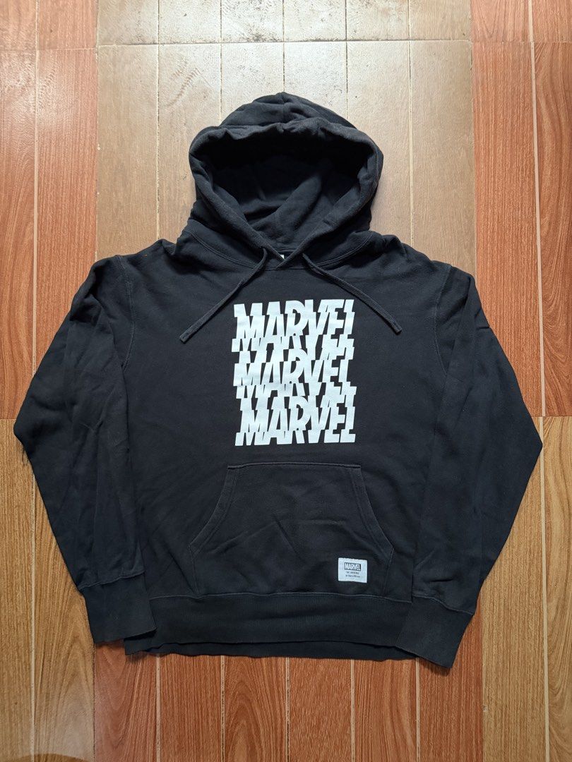 Marvel Black Graphic Hoodie (Category: Hoodies) located in Dasmarinas. Submitted by kylebecker (Listing ID 1468927339, Image 1). Description: - Color: Black - Design: Front glitch text effect graphic with a woven Marvel patch - Features: Kangaroo pocket, drawstring hood, and ribbed cuffs - Material: Comfortable cotton blend - Fit: Standard fit, great for everyday wear and Marvel fans - Condition: Brand new / Excellent quality - Shipping: Fast shi