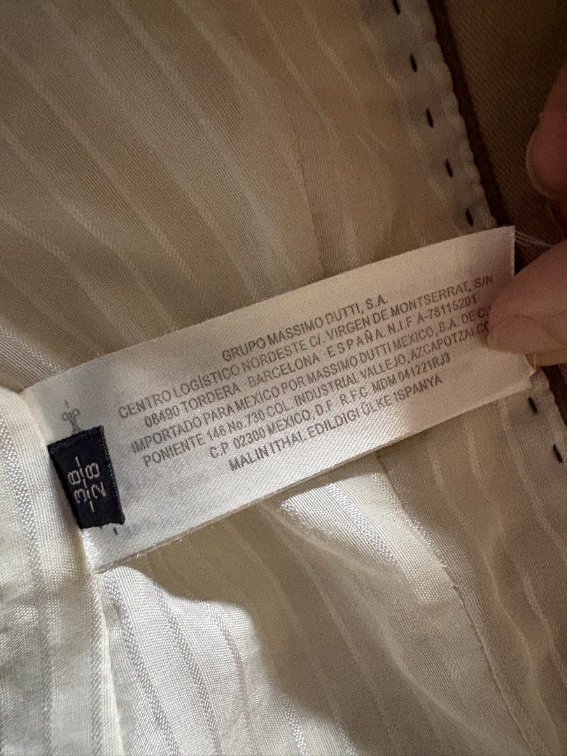 Massimo Dutti Beige Cotton Blend Blazer Jacket (Category: Coats, Jackets and Outerwear) located in Quezon City. Submitted by iris.edit (Listing ID 1468900310, Image 3). Description: - Brand: Massimo Dutti - Style: Classic structured fit beige blazer jacket - Size: 38 - Material: 97% cotton, 3% spandex outer shell; cotton and polyester blend lining - Details: Front button closures, buttoned cuffs, and utility chest pockets - Origin: Made in Portug