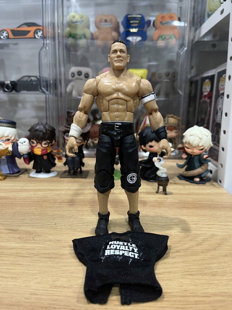 Mattel WWE Elite John Cena (Category: Action & Battle Toys) located in Bacoor. Submitted by chongscollectibles (Listing ID 1468840295, Image 2). Description: Tight joints. Good condition. What you see is what you get. Issues: - Swapped yung sneakers from Collector’s Ed Cena Elite (body and head is from Hall of Champions 4-pack Elite). - Slight dirt on wristband. Mop:Gcash Mod:Lalamove, LBC, J&T 📍The District Dasmariñas, Alabang Town Center, Fest