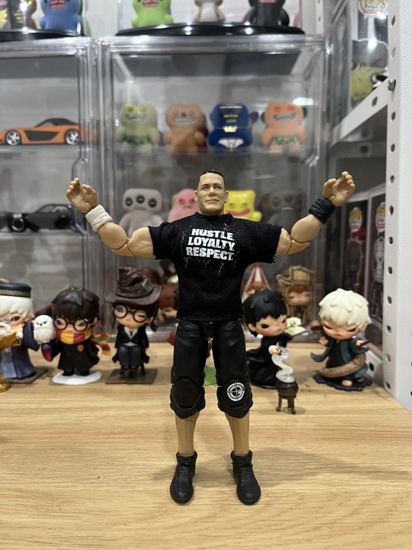 Mattel WWE Elite John Cena (Category: Action & Battle Toys) located in Bacoor. Submitted by chongscollectibles (Listing ID 1468840295, Image 1). Description: Tight joints. Good condition. What you see is what you get. Issues: - Swapped yung sneakers from Collector’s Ed Cena Elite (body and head is from Hall of Champions 4-pack Elite). - Slight dirt on wristband. Mop:Gcash Mod:Lalamove, LBC, J&T 📍The District Dasmariñas, Alabang Town Center, Fest