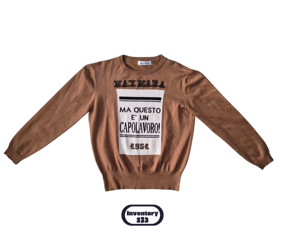 Max Mara Brown Knit Sweater with Graphic Print (Category: Longsleeves) located in Taguig. Submitted by regimennn (Listing ID 1468831149, Image 1). Description: - Brand: Max Mara Fits Small - Medium - Color: Brown - Material: Warm wool blend with a soft texture - Design: Long sleeves, crew neckline, ribbed cuffs and hem - Graphic: Large front box design featuring 'MA QUESTO E' UN CAPOLAVORO!' and year 1951.