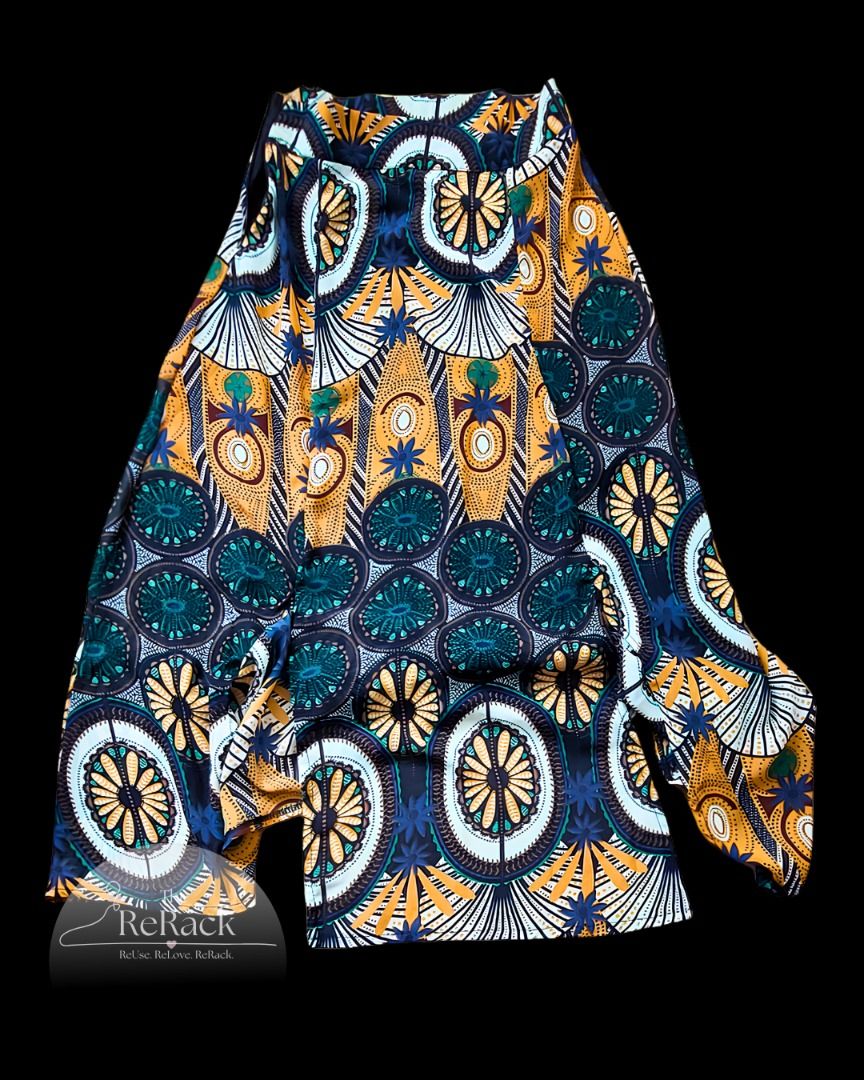 MAXI SKIRT (Category: Skirts) located in Calamba. Submitted by rackme (Listing ID 1468714419, Image 1). Description: 👗 MAXI SKIRT 💵 ₱250 ONLY!! (previous price posted ₱300) 📏 Small - Medium 💎 EXCELLENT CONDITION! ✨ This elegant maxi skirt features a striking geometric print, perfect for elevating any casual or dressy look. 👜 Item Specifics Floor-length maxi skirt featuring an intricate geometric and circular tribal pattern in shades of blue,