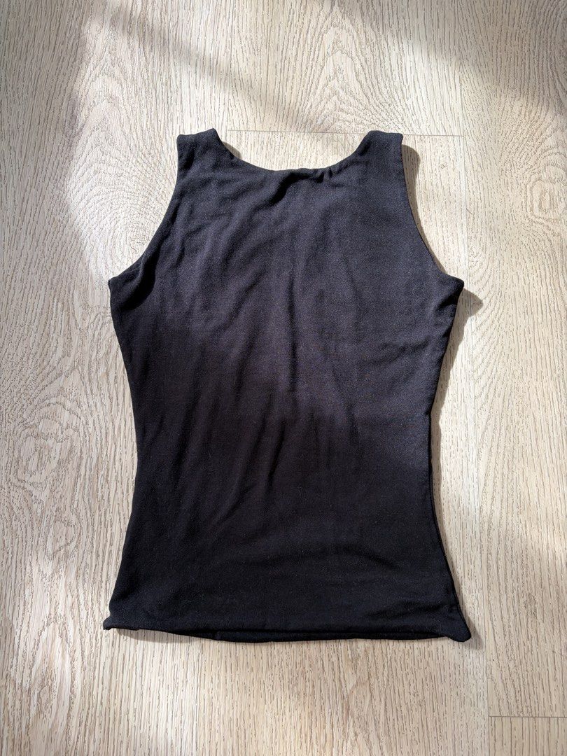 Mera Jacinta Tank Top (Category: Sleeveless) located in Makati City. Submitted by sbllia (Listing ID 1468771009, Image 2). Description: - Color: Solid black - Cotton spandex with stretch - Classic scoop neck / halter neck - Slim-fitting.