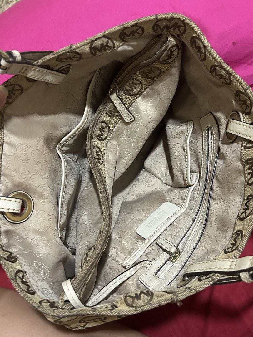 Michael Kors MK Monogram Beige Canvas Tote Bag (Category: Luxury Bags & Wallets) located in Caloocan City. Submitted by luvilegna (Listing ID 1468743247, Image 3). Description: -authentic - rfs: hindi na masyadong nagagamit.