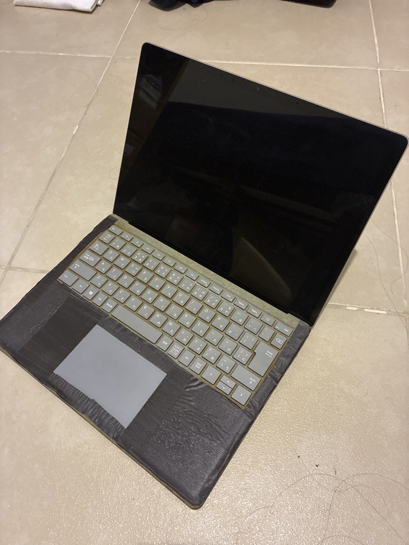 Microsoft Surface Laptop Japanese Keyboard (Category: Laptops & Notebooks) located in Las Pinas. Submitted by mrcolorless (Listing ID 1468861956, Image 2). Description: - Microsoft Surface Laptop (Silver Aluminum finish) - Japanese layout keyboard - Screen turns on normally, displays Windows logo - Perfect for daily tasks, typing, and web browsing - Note: Has a sticker on the lid and black tape applied around the palm rest area - Trackpad no long