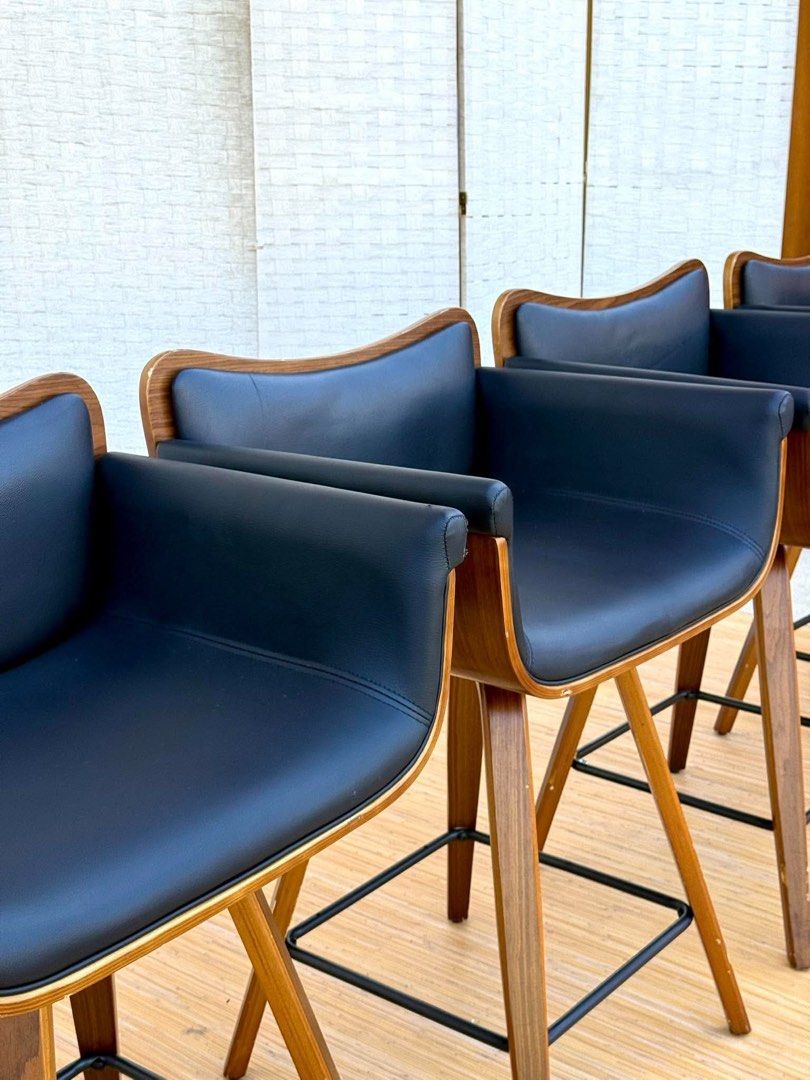 Mid-century modern wooden bar stools (Category: Chairs) located in Manila. Submitted by justinlei.103 (Listing ID 1468835892, Image 2). Description: JAPAN SURPLUS SWIVEL BLACK LEATHER BAR CHAIR WOODEN FRAME IN GOOD CONDITION SIZE: 23H x 21.5L x 17W inches.