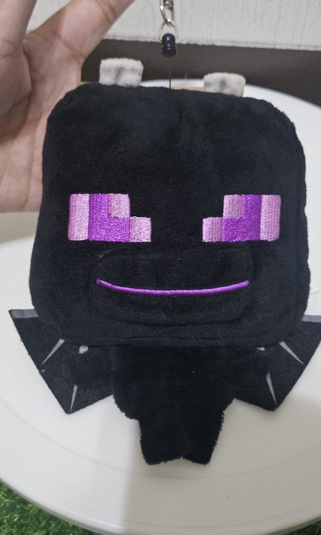 Minecraft ender dragon i.d holder (Category: Plushies & Soft Toys) located in Umingan. Submitted by liezelsona48963 (Listing ID 1468854438, Image 2). Description: Minecraft Ender Dragon plush multi-case or pass case charm 7 inches mop gcash.