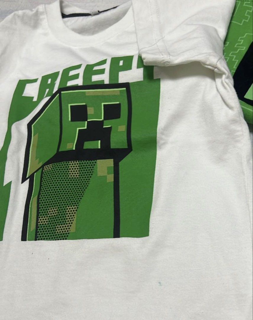 Minecraft Tshirt (Category: Babies & Kids Fashion) located in Caloocan City. Submitted by verygoodmama (Listing ID 1468808881, Image 3). Description: Preloved Kids’ Shirts 💚 Size: 3–4 years old Used but still in good condition ✨ Both shirts sold as a set. May small stain po. Nasa last picture Location: Monumento .