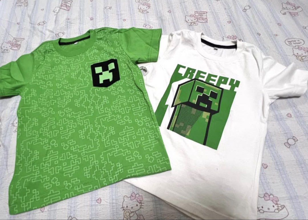 Minecraft Tshirt (Category: Babies & Kids Fashion) located in Caloocan City. Submitted by verygoodmama (Listing ID 1468808881, Image 2). Description: Preloved Kids’ Shirts 💚 Size: 3–4 years old Used but still in good condition ✨ Both shirts sold as a set. May small stain po. Nasa last picture Location: Monumento .