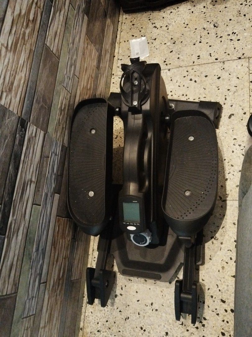 Mini Elliptical Stepper Machine Exercise Equipment Black (Category: Cardio & Fitness Machines) located in Valenzuela. Submitted by LEXXZ_445 (Listing ID 1468782399, Image 1). Description: - Color: Sleek black - Flywheel Weight: 1.6kg for smooth motion - Slope Adjustment: 3 gears to customize your workout intensity - Built-in Display: Easily tracks calories, distance, speed, and time - Design: Compact and space-saving, ideal for home workouts PLS 