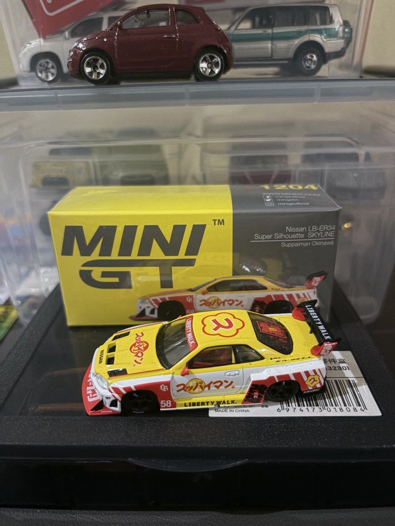 Mini GT R34 “Suppaiman Okinawa” (Category: Vehicle & Diecast Models) located in Manila. Submitted by stealss (Listing ID 1468840617, Image 1). Description: Unsealed No issues Firm.