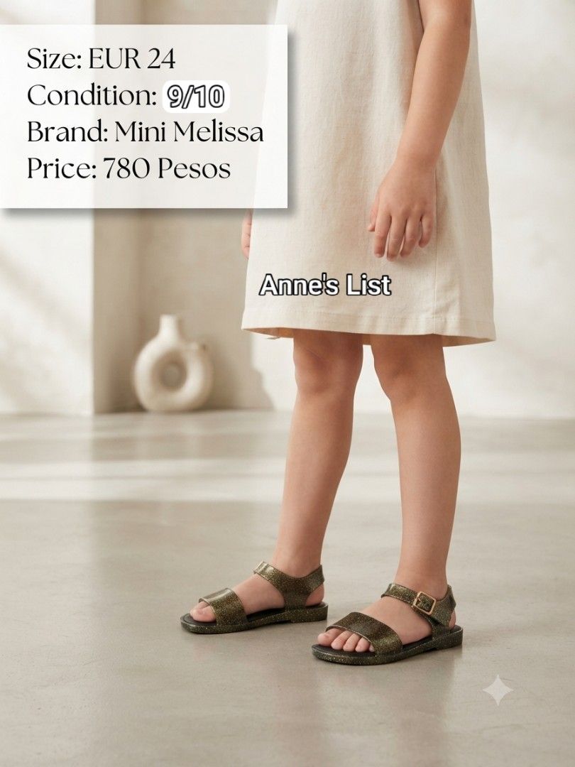 Mini Melissa Glitter Sandals EUR 24 (Category: Babies & Kids Fashion) located in Santa Maria. Submitted by anne_s.list (Listing ID 1468795299, Image 2). Description: - Brand: Mini Melissa - Color: Black and gold sparkle finish - Size: EUR 24 (14.5 cm) - Material: Classic jelly with comfortable cushioned soles - Closure: Adjustable ankle strap with gold-toned hardware - Condition: Excellent, worn a few times with minimal signs of wear on the botto