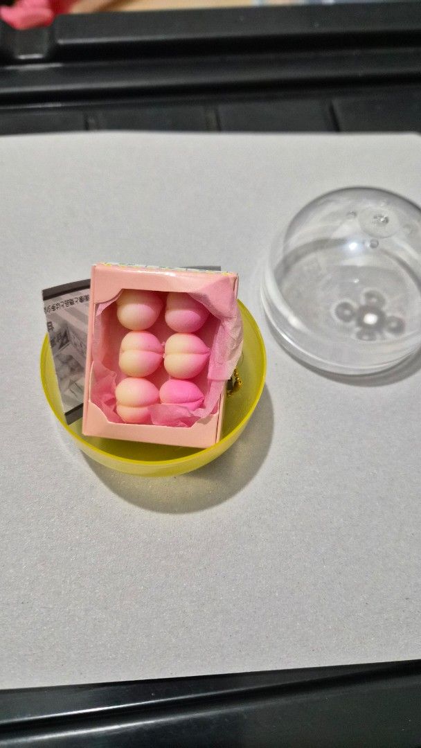 Miniature Peach Box Squishy Keychain Gachapon (Category: Designer & Blind Box Toys) located in Las Pinas. Submitted by vilea_14 (Listing ID 1468838387, Image 1). Description: Peach Squishy Gacha from toys r us srp200 mod:lalamove/jnt mop:bank/gcash/meetup.