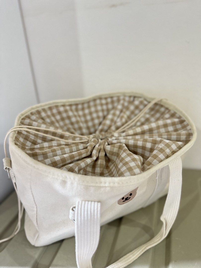 Minimalist Bear Canvas Baby Bag (Category: Tote Bags) located in Kalibo. Submitted by xoxo.kaebb (Listing ID 1468768541, Image 2). Description: Spacious/ large capacity baby bag with drawstring closure. RFS: Decluttering.