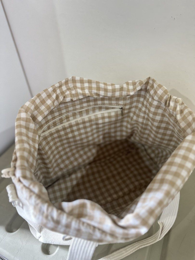 Minimalist Bear Canvas Baby Bag (Category: Tote Bags) located in Kalibo. Submitted by xoxo.kaebb (Listing ID 1468768541, Image 3). Description: Spacious/ large capacity baby bag with drawstring closure. RFS: Decluttering.