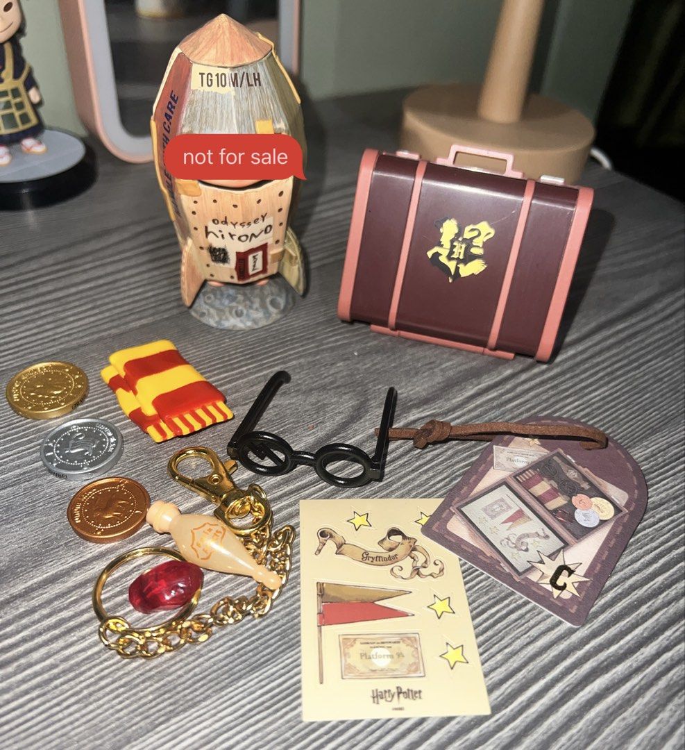 Miniso Harry Potter Suitcase Blind Box (Category: Designer & Blind Box Toys) located in Antipolo. Submitted by kathmerx (Listing ID 1468881108, Image 3). Description: WTS LFB PH Miniso Harry Potter Suitcase Blind Box - Official Miniso Harry Potter box pendant collectible set - Unboxed only to check contents; complete items; BIB - Includes miniature suitcase trunk, Gryffindor scarf, and iconic round glasses - Comes with gold and silver coins, poti