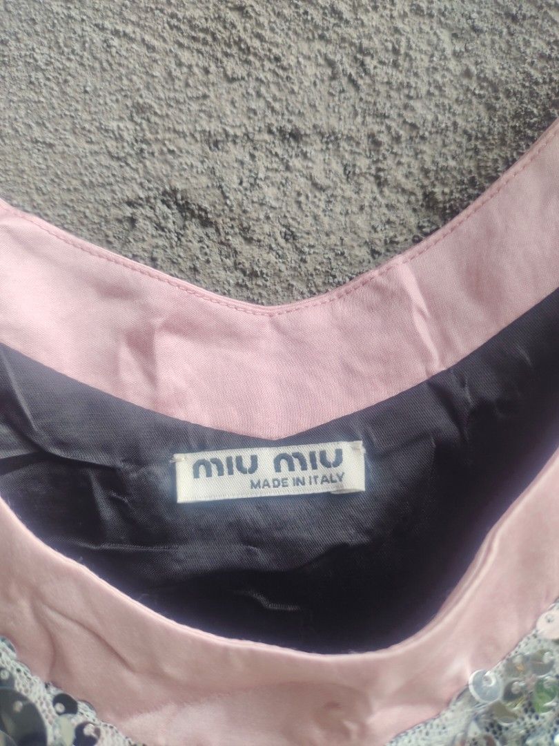 Miu miu (Category: Sleeveless) located in Legazpi City. Submitted by jaycie.thrift23 (Listing ID 1468713203, Image 3). Description: miu miu excellent to as new 16W 12L.