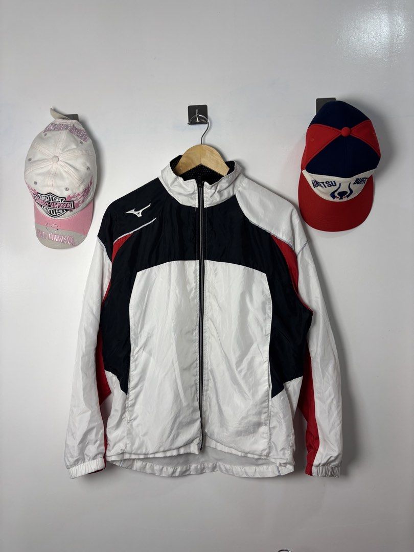 Mizuno Sport Windbreaker Jacket White Black Red (Category: Coats, Jackets and Outerwear) located in Calbayog City. Submitted by zaxcheus_castillo1708 (Listing ID 1468752015, Image 1). Description: - Brand: Mizuno - Style: Sport jacket / lightweight windbreaker - Colorway: White, black, and red colorblock - Features: Full zip front, stand collar, contrast panels on chest and sleeves - Details: Ribbed cuffs and hem - Condition: Good pre-loved / rea