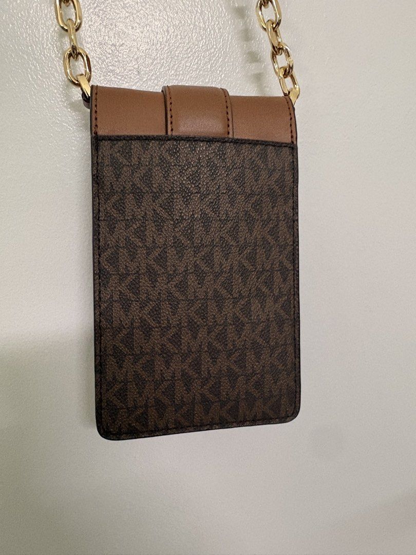 MK Phone Crossbody Bag (Category: Cross-body Bags) located in Pasay City. Submitted by weartheclothes.mnl_shop (Listing ID 1468738770, Image 3). Description: MK Carmen Phone Crossbody Bag Almost New Used twice .