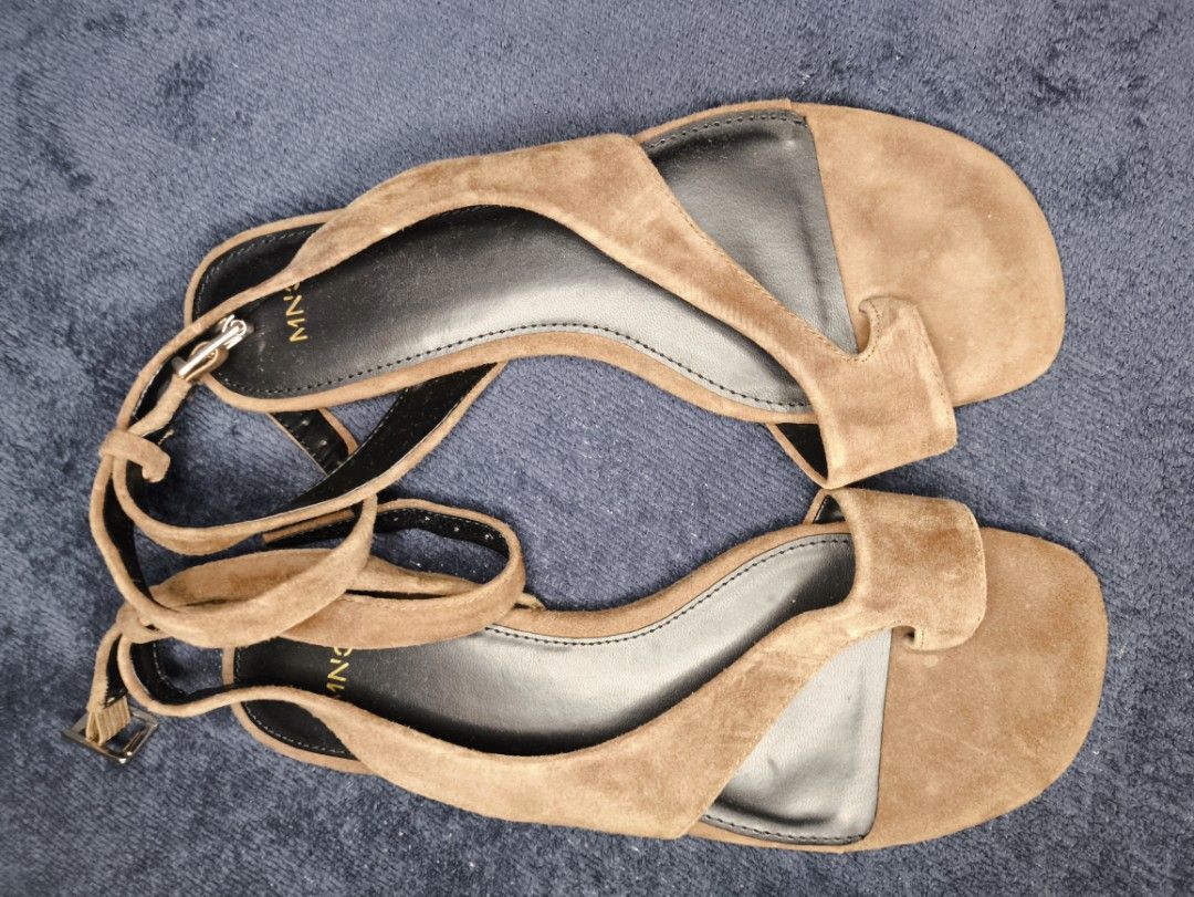 MNG Brown suede Flat Toe ring Sandals (Category: Flats & Sandals) located in Las Pinas. Submitted by rose.luab (Listing ID 1468857680, Image 2). Description: preloved brown suede flat toe-ring sandals by Mango (specifically the Mango Leather Straps Sandals). • Brand: Mango • Style: Flat toe-ring sandal with crisscross strap design and an adjustable ankle strap/bracelet with a metal buckle closure • Material: 100% goat suede leather upper with a s