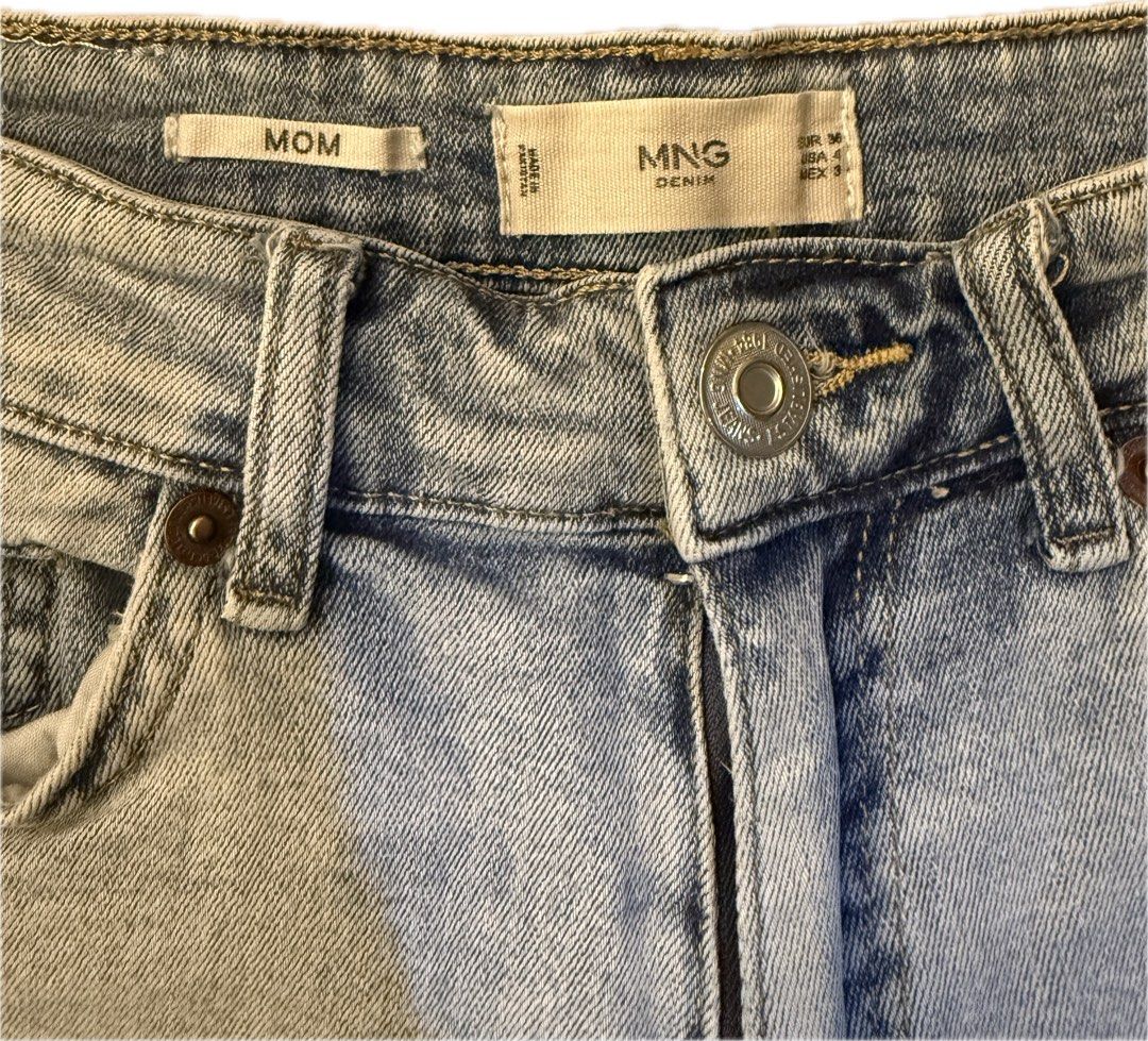 MNG Mango Mom Jeans Light Wash Size 4 Eu36 (Category: Jeans) located in Cavite. Submitted by fitarchive (Listing ID 1468714592, Image 3). Description: - Brand: Mango - Style: Mom fit denim jeans - Color/Wash: Light blue - Size: EUR 36 / USA 4 / MEX 3 - Features: High-waisted, front button and zip closure, classic five-pocket design, belt loops - Origin: Made in Pakistan - Condition: Perfect casual staple for everyday outfits.