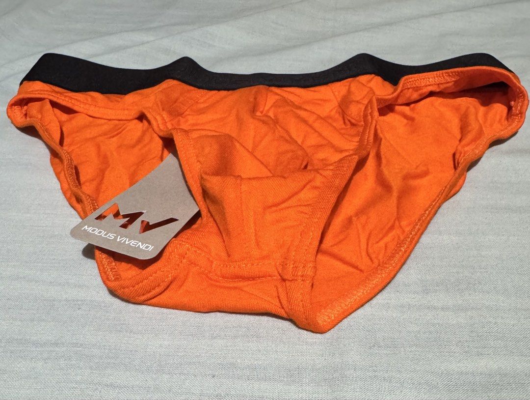 Modus Vivendi Orange Briefs (Category: Underwear) located in Caloocan City. Submitted by rodelramos.rivera (Listing ID 1468929052, Image 2). Description: - Brand: Modus Vivendi - Style: Bright orange briefs with subtle black elastic waistband - Size: One (Article MV-GIFT) - Condition: Brand new, unworn, and still sealed in original zip bag - Inclusions: Comes with original tag and packaging pouch.