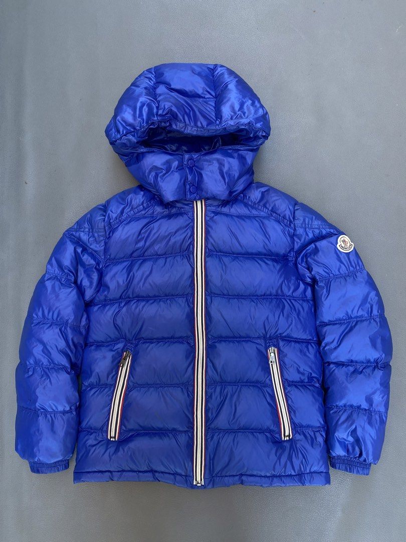 Moncler Blue Down Puffer Jacket Size 140 (Category: Coats, Jackets and Outerwear) located in Pozorrubio. Submitted by izaykite2g (Listing ID 1468815514, Image 1). Description: - Authentic Moncler kids down puffer jacket in a striking royal blue shade - 18 inches width - 22 inches length - fit to small to medium adult womens - issue : last 2 picture - Size 140 (ideal for kids) - Warm down-filled quilted construction to keep out the cold - Features