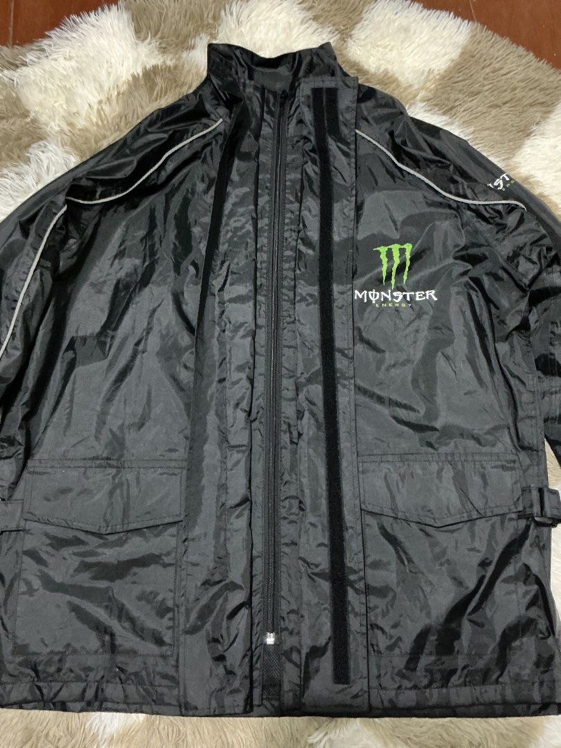 Monster Energy 2000s Reflective Rain Jacket (Category: Coats, Jackets and Outerwear) located in Bulacan. Submitted by garmentsbyadi. (Listing ID 1468782759, Image 3). Description: ⚡ MONSTER ENERGY 2000s REFLECTIVE RAIN JACKET ⚡ 🖤 Y2K Vintage Streetwear | Reflective Design Bring back the 2000s with this Monster Energy reflective rain jacket! Perfect for vintage streetwear lovers, Y2K fits, and bold street-style looks. 🏁 ✨ Details: * Brand/Design