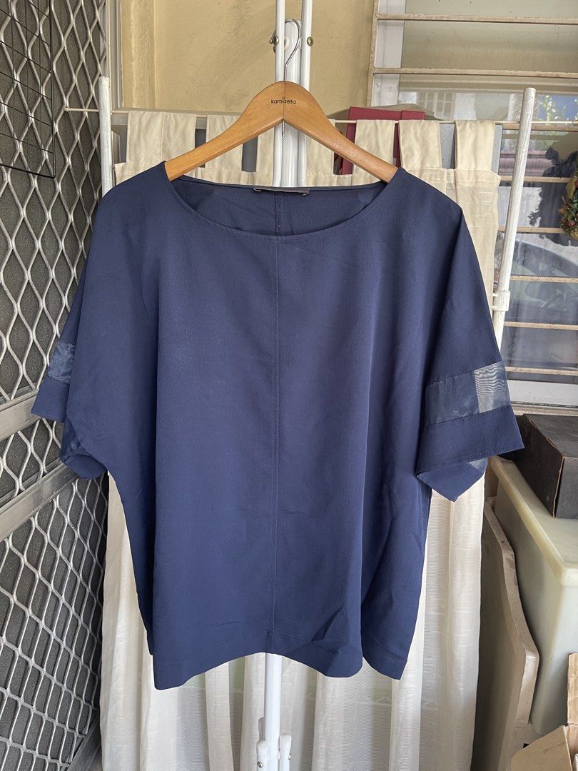 M&S dark blue blouse (Category: Blouses) located in Mandaluyong City. Submitted by coolmeybab (Listing ID 1468788686, Image 1). Description: Size 18 Navy blue Short sleeves w/ organza strip on the sleeves.