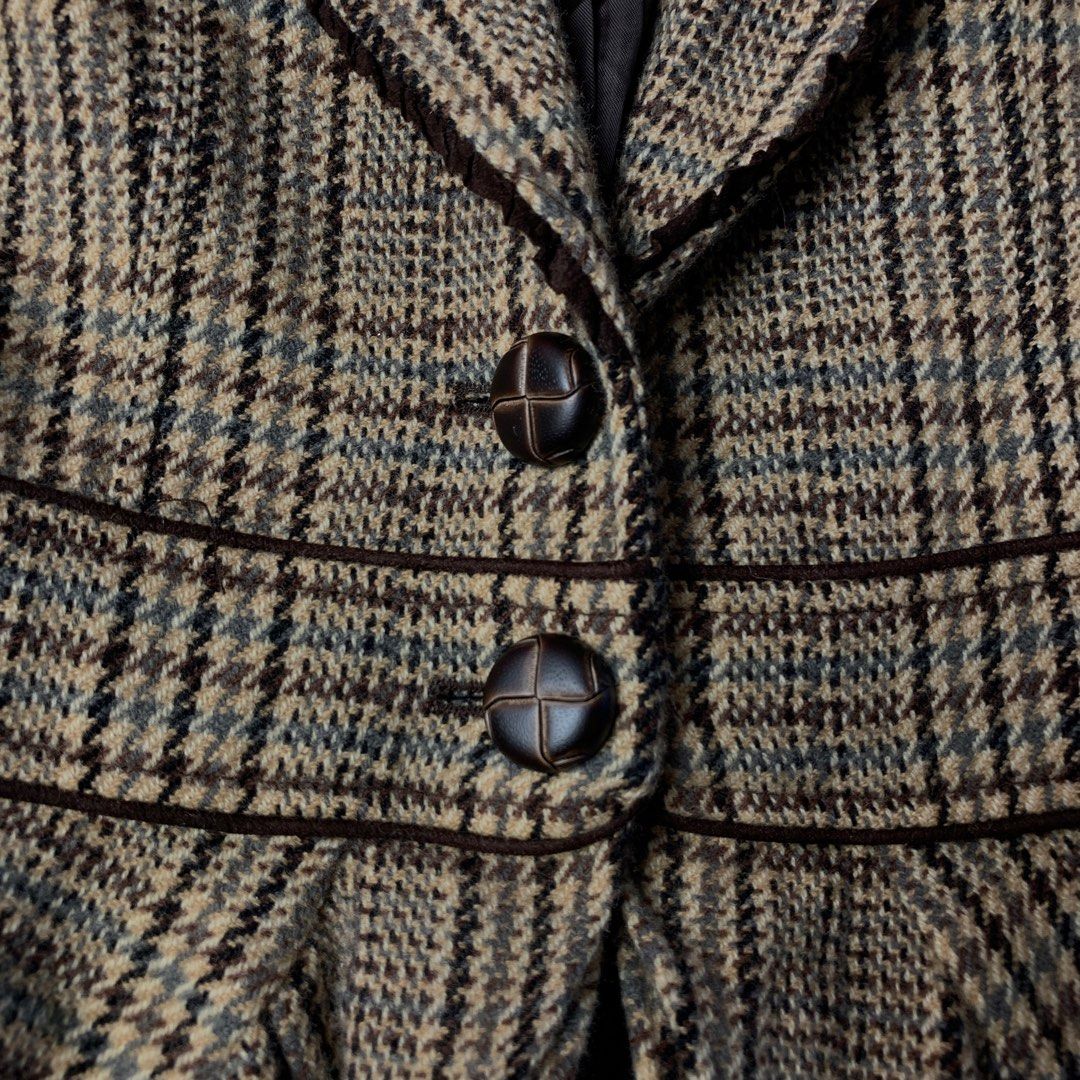 MUST-BE Brown Plaid Peplum Blazer Jacket (Category: Coats, Jackets and Outerwear) located in Rizal. Submitted by shop_ms.lai (Listing ID 1468772430, Image 3). Description: - Brand: Must-Be - Size: 85-92-160 - Design: Brown plaid with structured fit and flattering flared peplum hem - Details: Contrast brown trim on collar and lapels, two dark brown front buttons - Interior: Fully lined with dark brown fabric - Condition: Excellent pre-loved condit