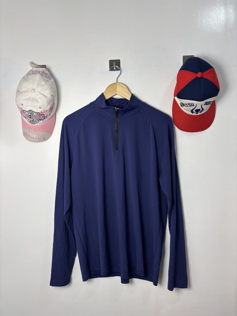 Navy Blue Long Sleeve Quarter Zip Pullover (Category: Coats, Jackets and Outerwear) located in Calbayog City. Submitted by zaxcheus_castillo1708 (Listing ID 1468752939, Image 1). Description: - Color: Navy blue - Style: Long sleeve quarter-zip pullover with mock neck - Details: Black zipper pull, minimal branding - Material: Smooth, lightweight athletic fabric - Best For: Layering, workouts, or cool weather.