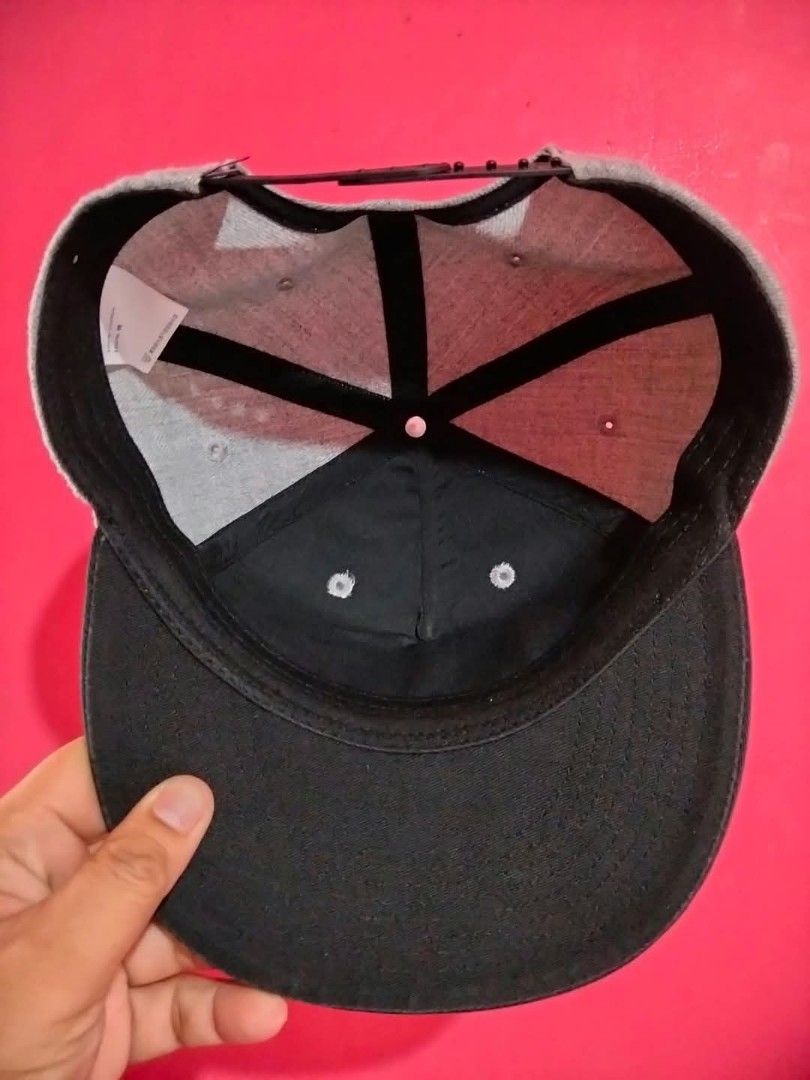 Navy Co. Friday The 13th Snapback Cap (Category: Caps & Hats) located in Mangaldan. Submitted by niftythrifty69 (Listing ID 1468734233, Image 3). Description: - Brand: Navy Co. - Design: Grey and black snapback with embroidered Friday The 13th patch and red 3 - Material: 100% cotton - Fit: Adjustable plastic strap at the back - Condition: Structured crown with a clean interior sweatband - Perfect for horror movie fans and everyday streetwear.
