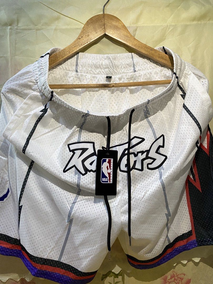 NBA Team Basketball Shorts Multiple Styles (Category: Shorts) located in Bacoor. Submitted by fourtwonine_04 (Listing ID 1468796203, Image 2). Description: - Available Teams: Chicago Bulls, Toronto Raptors, OKC Thunder, and more - Material: Breathable mesh fabric for maximum comfort - Fit: Elastic waistband with adjustable drawstrings - Details: Embroidered team logos and player numbers - Size: XL - Multiple colorways available.