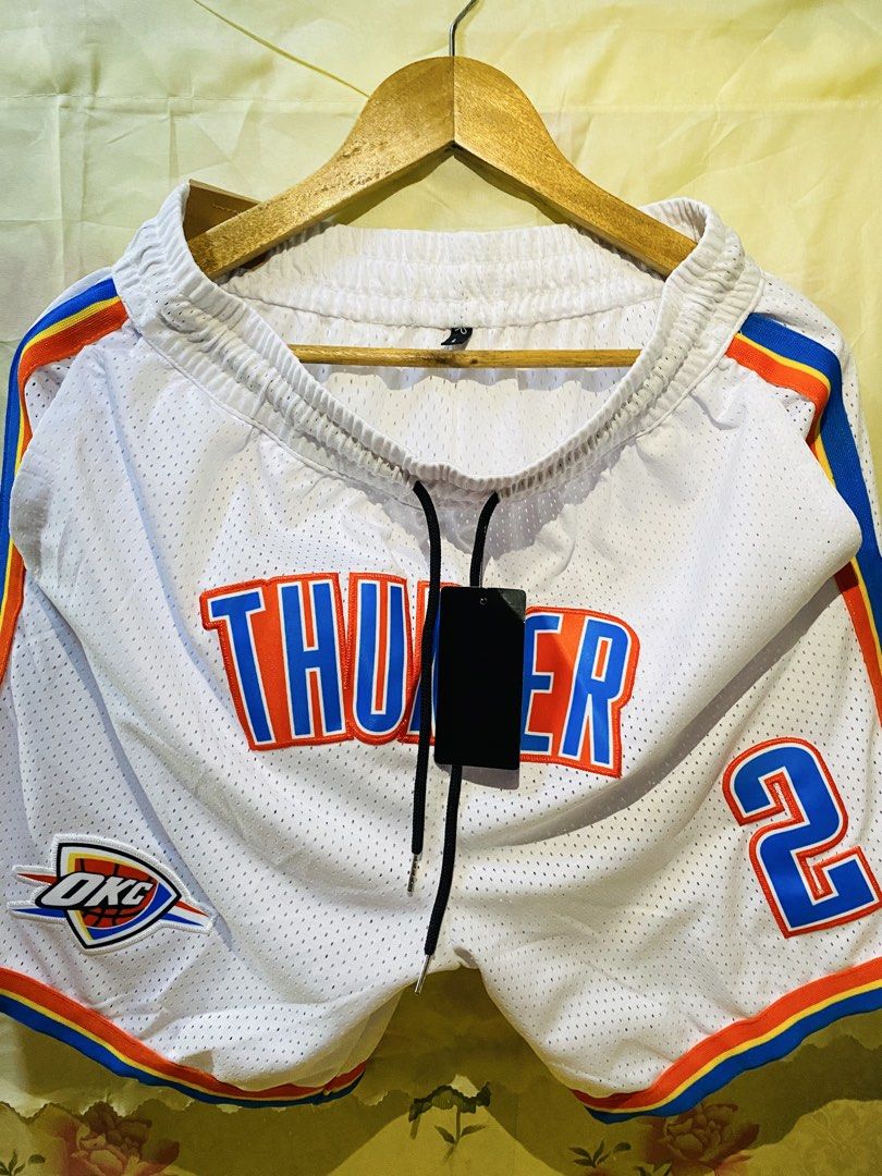 NBA Team Basketball Shorts Multiple Styles (Category: Shorts) located in Bacoor. Submitted by fourtwonine_04 (Listing ID 1468796203, Image 3). Description: - Available Teams: Chicago Bulls, Toronto Raptors, OKC Thunder, and more - Material: Breathable mesh fabric for maximum comfort - Fit: Elastic waistband with adjustable drawstrings - Details: Embroidered team logos and player numbers - Size: XL - Multiple colorways available.