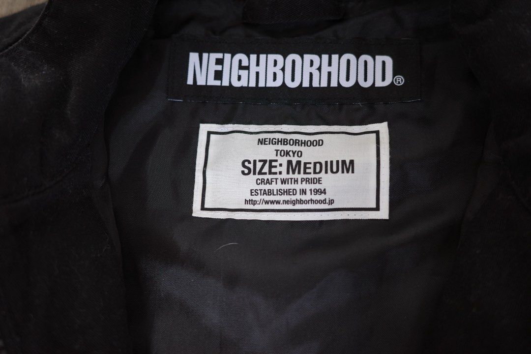Neighborhood Tokyo Squad Black Jacket Size Medium (Category: Coats, Jackets and Outerwear) located in Santa Rosa. Submitted by mooseproject (Listing ID 1468754254, Image 3). Description: - Brand: Neighborhood Tokyo Squad - Color: Black - Size: Medium - Closure: Full zip front - Details: Ribbed cuffs and collar - Chest Print: White 'NBHD SQUAD' text on left chest - Back Print: Large graphic with 'NBHD 1994-2018', 'THE FILTH AND THE FURY', and 'CRA